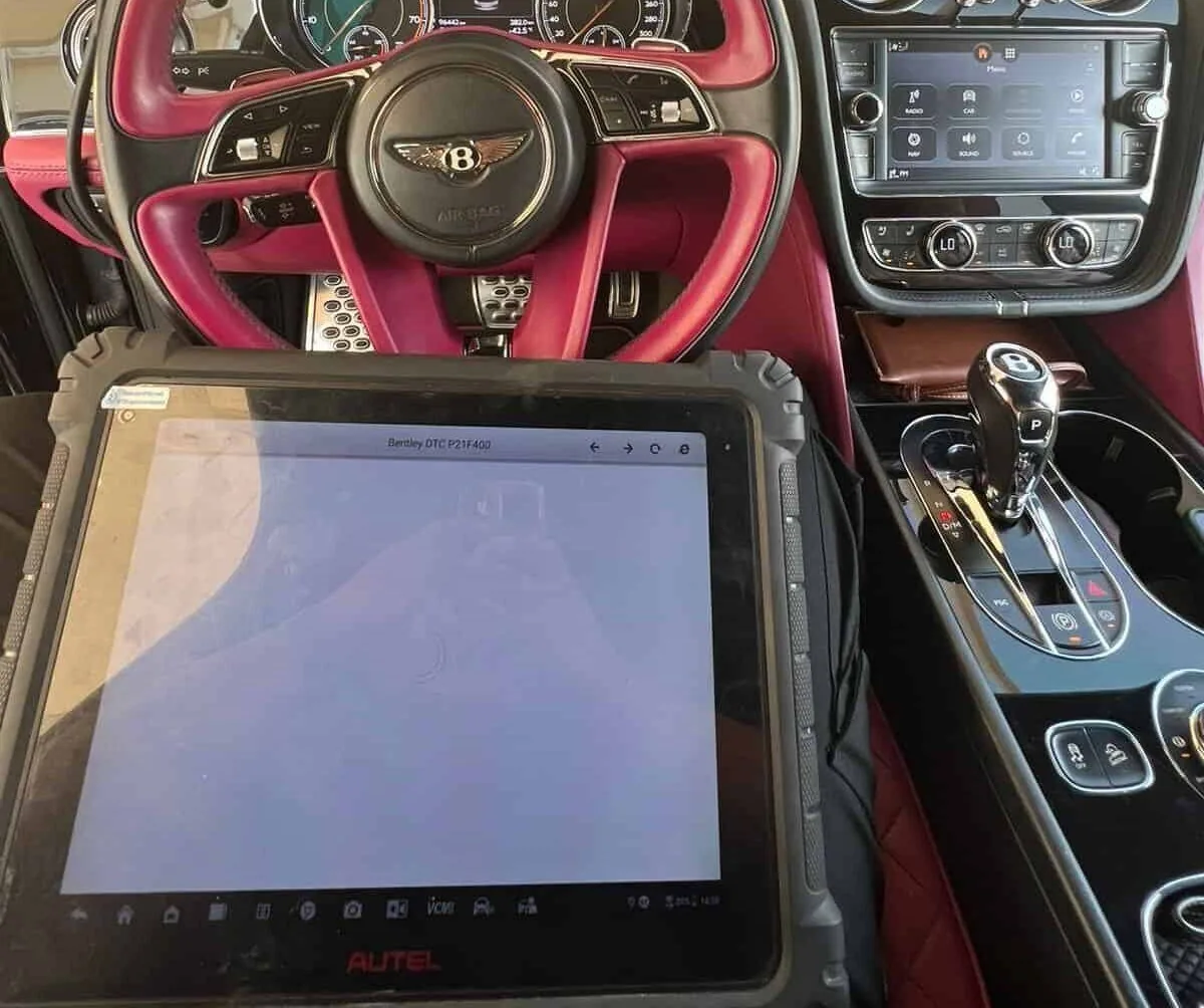 Mobile Car Battery Qatar technician performing Exide Battery Replacement on-site